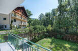 Discover a charming property nestled in a serene, natural setting.