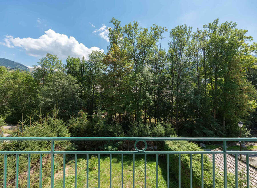 Enjoy breathtaking views from this stunning property! This home boasts a beautiful outdoor space with lush greenery and a serene atmosphere.
