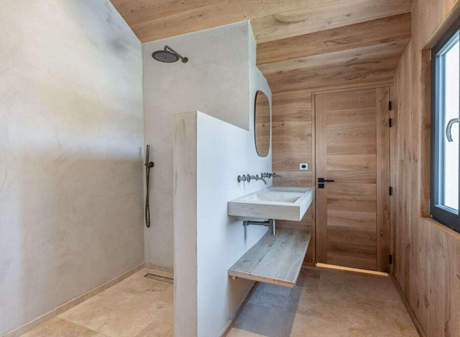 Step into a world of serene luxury with this stunning bathroom design.