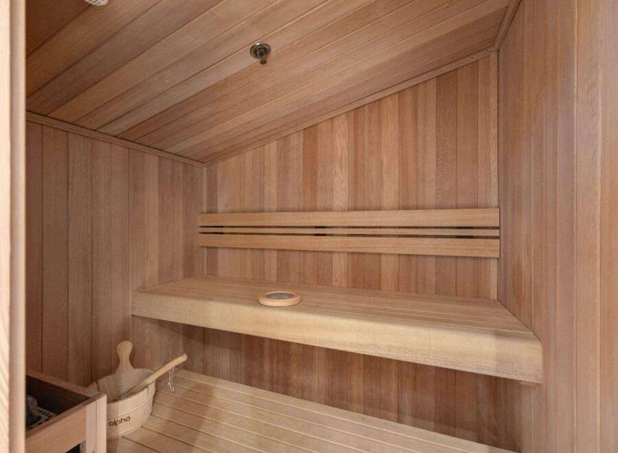 Step into relaxation with this stunning sauna, a perfect addition to any luxury home.