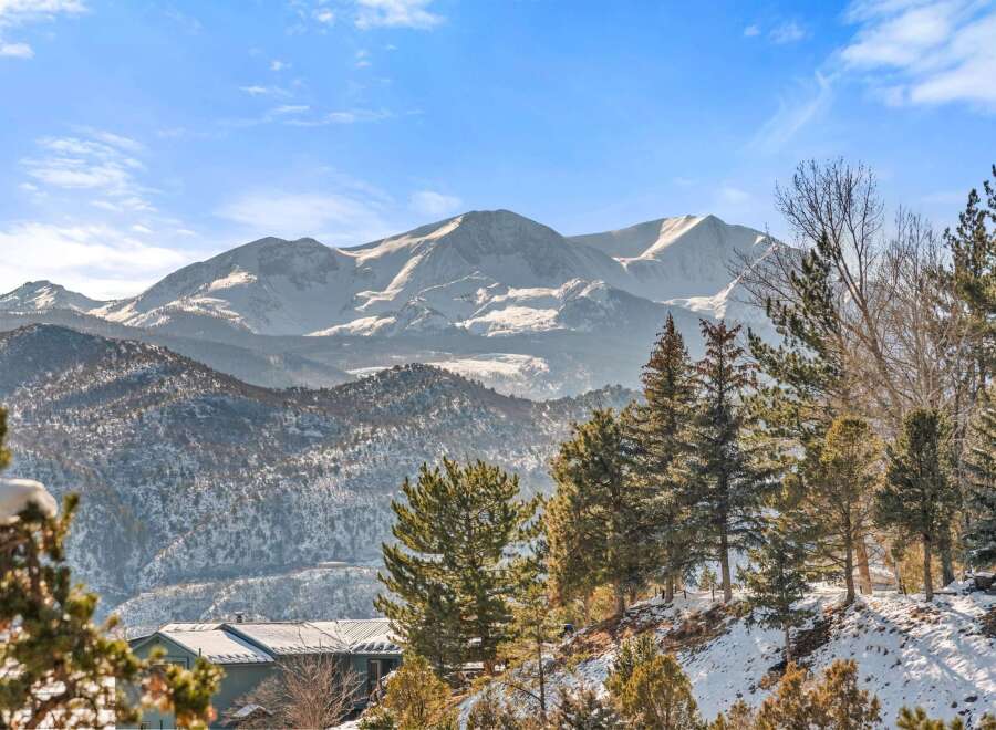 Nestled amidst the majestic mountain range, this property offers breathtaking views and a serene atmosphere.