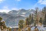 Nestled amidst the majestic mountain range, this property offers breathtaking views and a serene atmosphere.