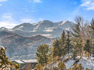 Nestled amidst the majestic mountain range, this property offers breathtaking views and a serene atmosphere.