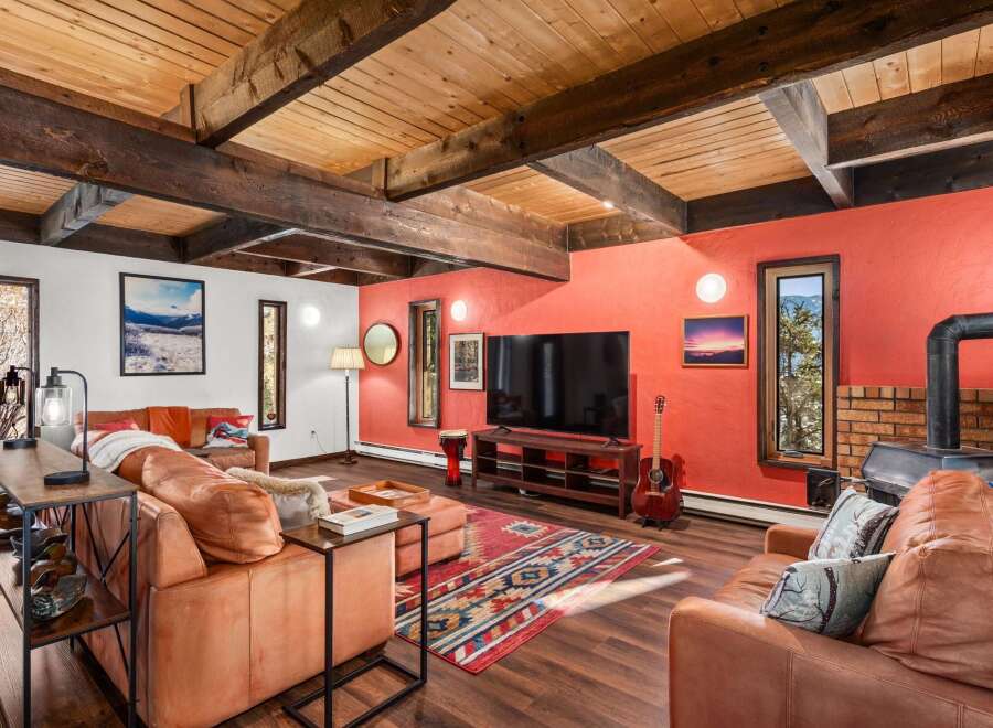 Step into a cozy living space with a rustic charm.