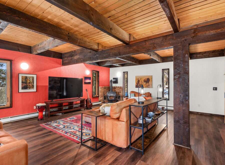 Step into a cozy living space with rustic charm.