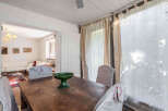 Discover the charm of this inviting dining area, perfect for gatherings.