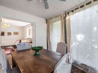 Discover the charm of this inviting dining area, perfect for gatherings.