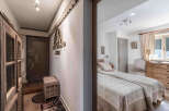 Step into this charming property and discover a cozy bedroom with a welcoming ambiance.