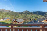 Enjoy breathtaking mountain views from this charming property.