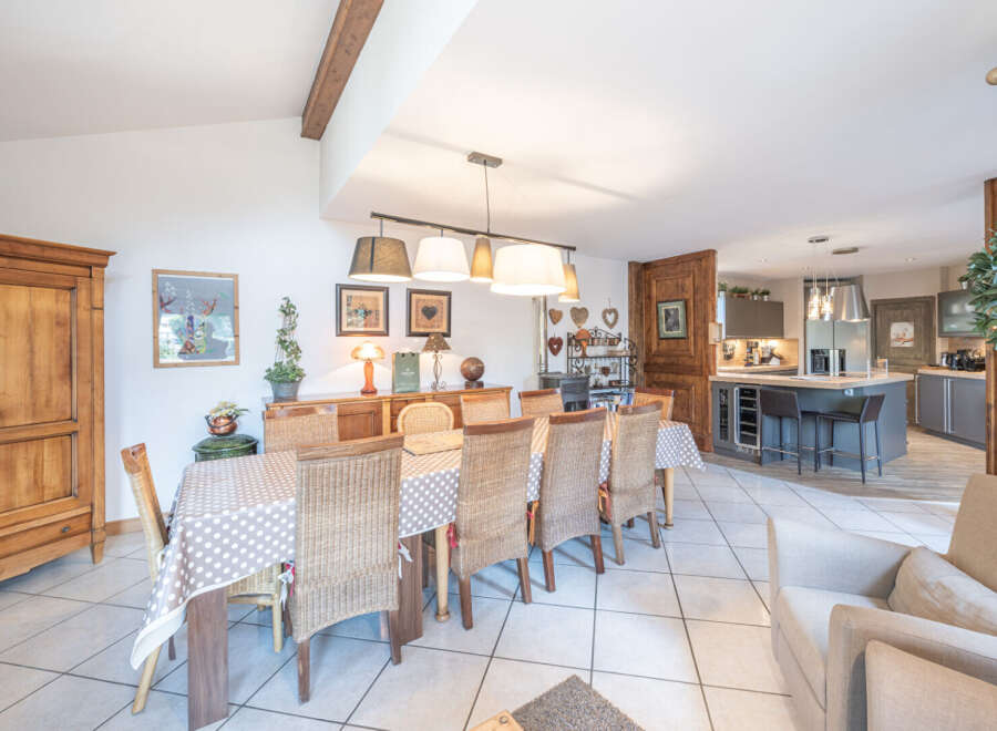 This stunning property boasts a spacious dining area, perfect for hosting gatherings.