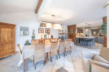 This stunning property boasts a spacious dining area, perfect for hosting gatherings.