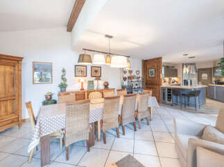 This stunning property boasts a spacious dining area, perfect for hosting gatherings.
