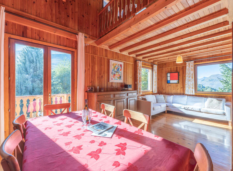 This charming wooden cabin offers a cozy and inviting atmosphere, perfect for a relaxing getaway.