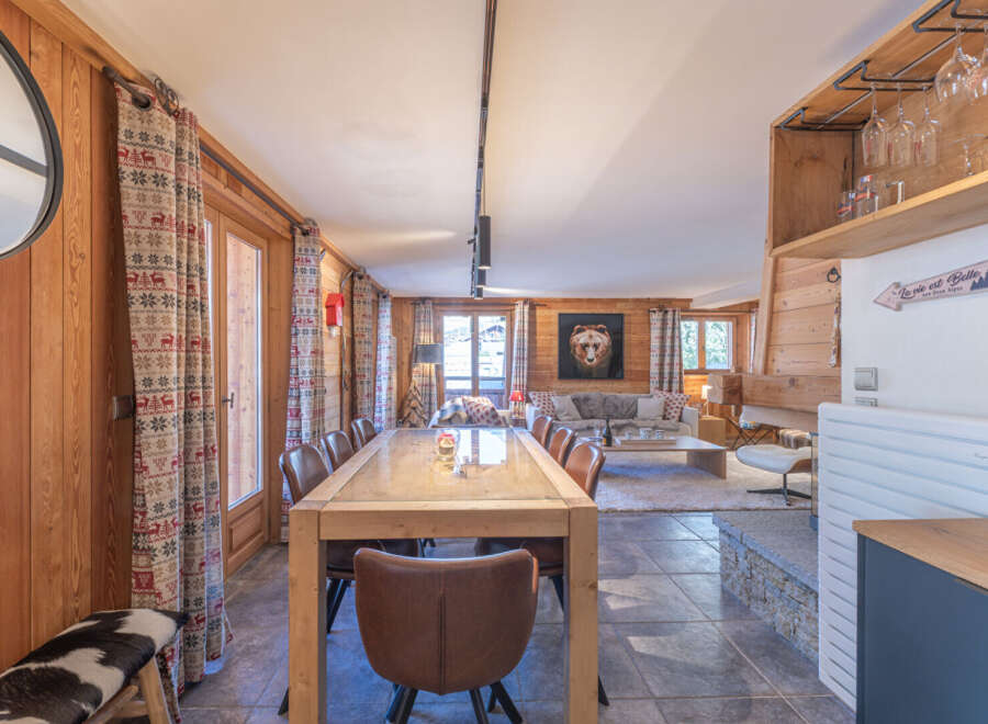 Experience the charm of this stunning property, featuring a spacious dining area perfect for gatherings.