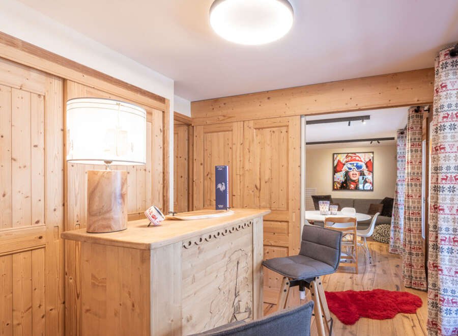 Discover the charm of this beautifully designed property, featuring a cozy bar area perfect for entertaining.