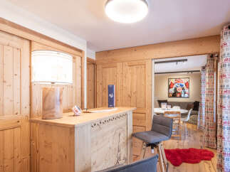 Discover the charm of this beautifully designed property, featuring a cozy bar area perfect for entertaining.