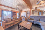 Experience the charm of this stunning property, featuring a cozy living room with a fireplace and a spacious layout.