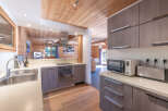 Discover the charm of this stunning kitchen, featuring a modern design and high-end appliances.