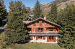 Discover the charm of this stunning wooden chalet nestled amidst the serene mountains.