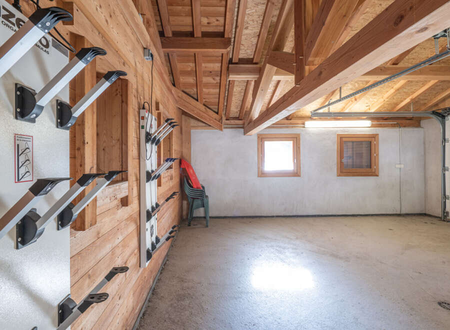 This spacious garage offers ample storage and a unique design.