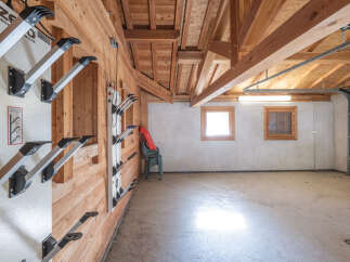 This spacious garage offers ample storage and a unique design.