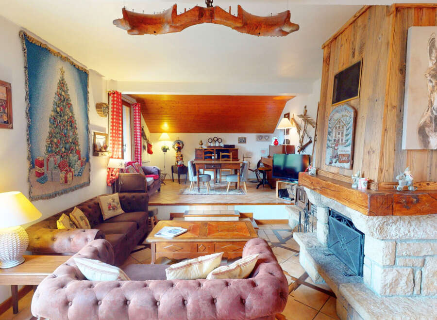 Step into a cozy living space with a rustic charm, perfect for a relaxing retreat.