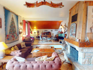 Step into a cozy living space with a rustic charm, perfect for a relaxing retreat.