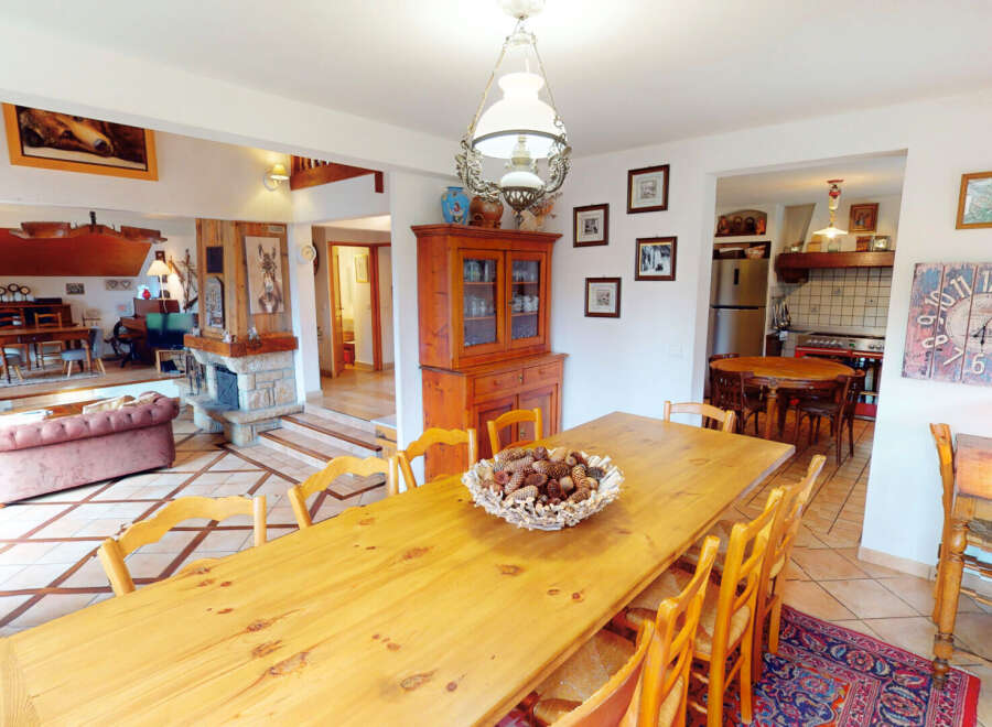 Step into this charming home and be captivated by its inviting dining area, perfect for gatherings.