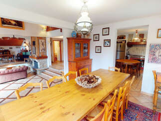 Step into this charming home and be captivated by its inviting dining area, perfect for gatherings.