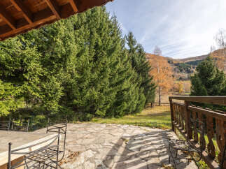 Enjoy the tranquility of this stunning property, featuring a beautifully designed patio and lush surroundings.