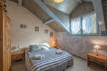 Discover the charm of this cozy bedroom, perfect for a relaxing retreat.