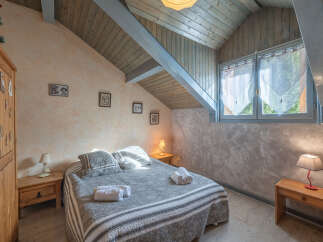 Discover the charm of this cozy bedroom, perfect for a relaxing retreat.