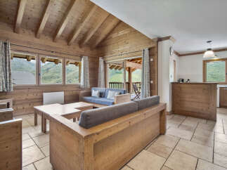 Experience the charm of this stunning wooden chalet, perfect for a cozy getaway.