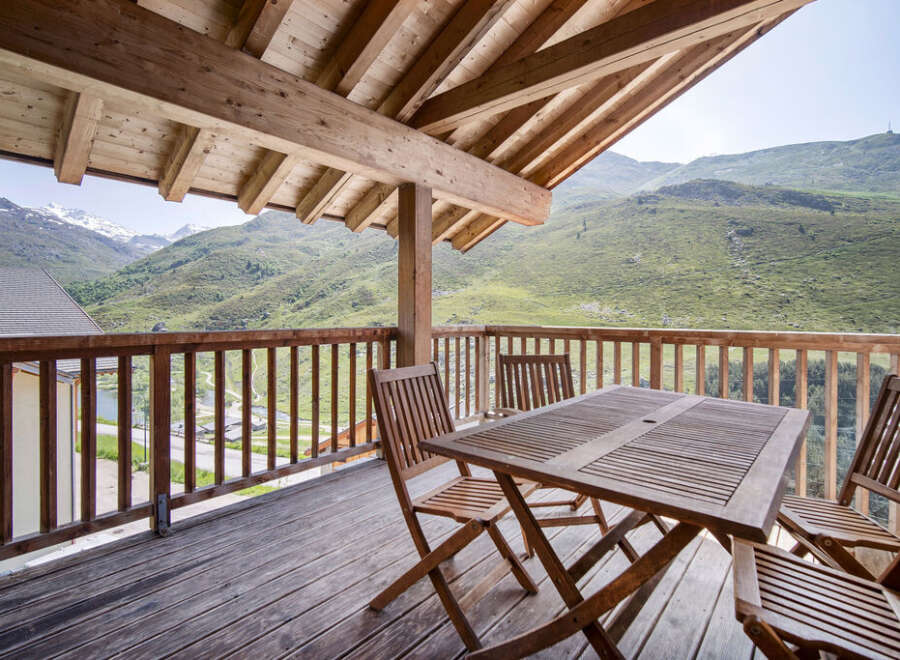 Enjoy breathtaking mountain views from this stunning balcony.