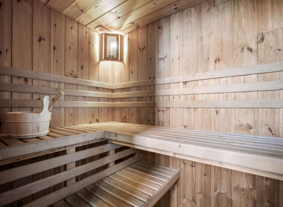 Step into relaxation with this stunning sauna.