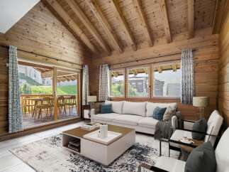 Experience the warmth of this stunning chalet-style living room, featuring beautiful wooden walls and ceilings.