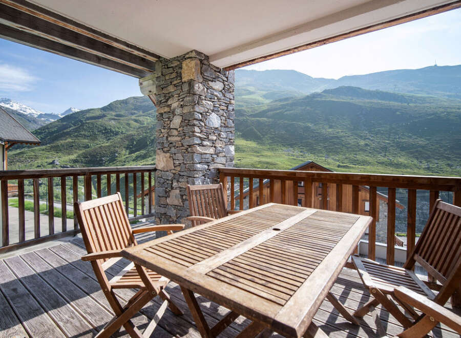 Enjoy breathtaking mountain views from this stunning balcony.