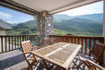 Enjoy breathtaking mountain views from this stunning balcony.