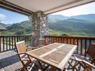 Enjoy breathtaking mountain views from this stunning balcony.
