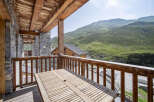Enjoy breathtaking mountain views from this stunning balcony.