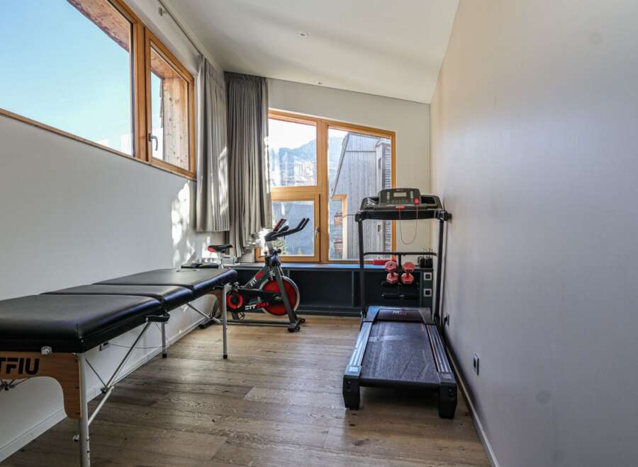 This home gym offers a dedicated space for fitness enthusiasts.