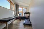 This home gym offers a dedicated space for fitness enthusiasts.