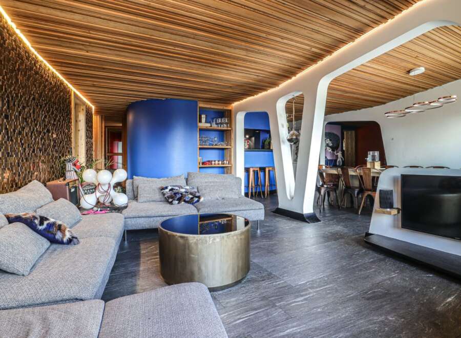 Step into modern luxury with this stunning property, showcasing a unique blend of contemporary design and natural elements.