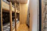 Step into this cozy bunk room, perfect for a family getaway or a fun space for kids.