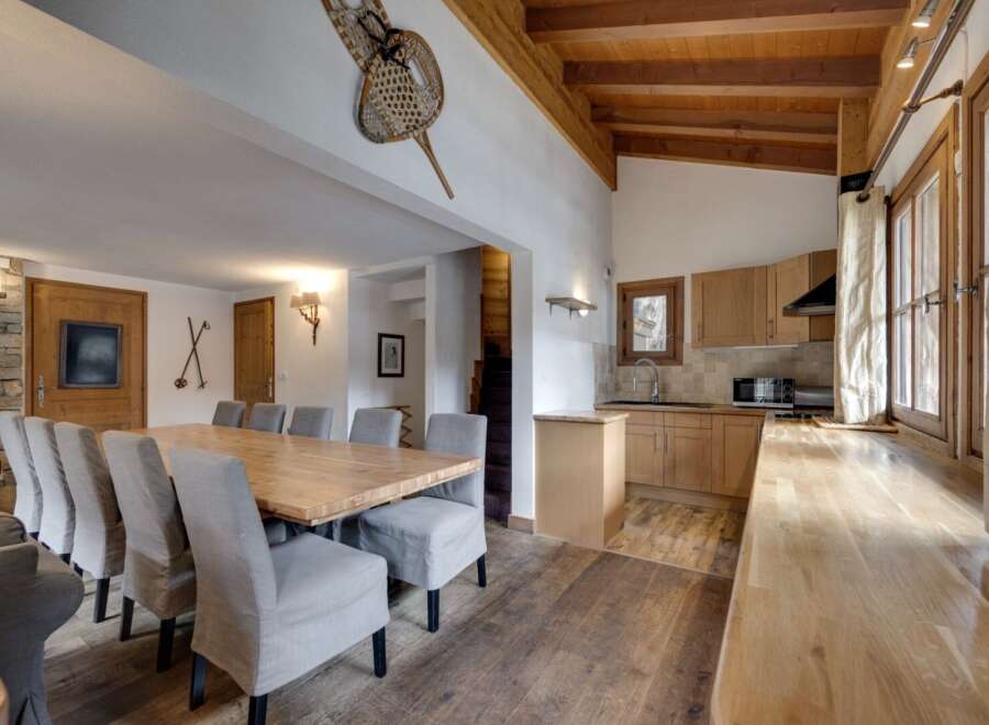 Experience the charm of this stunning property, featuring a spacious dining area perfect for gatherings.