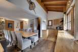 Experience the charm of this stunning property, featuring a spacious dining area perfect for gatherings.