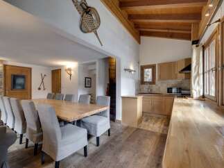 Experience the charm of this stunning property, featuring a spacious dining area perfect for gatherings.