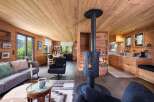 Experience the warmth of this stunning chalet, featuring exquisite wooden interiors and a cozy fireplace.