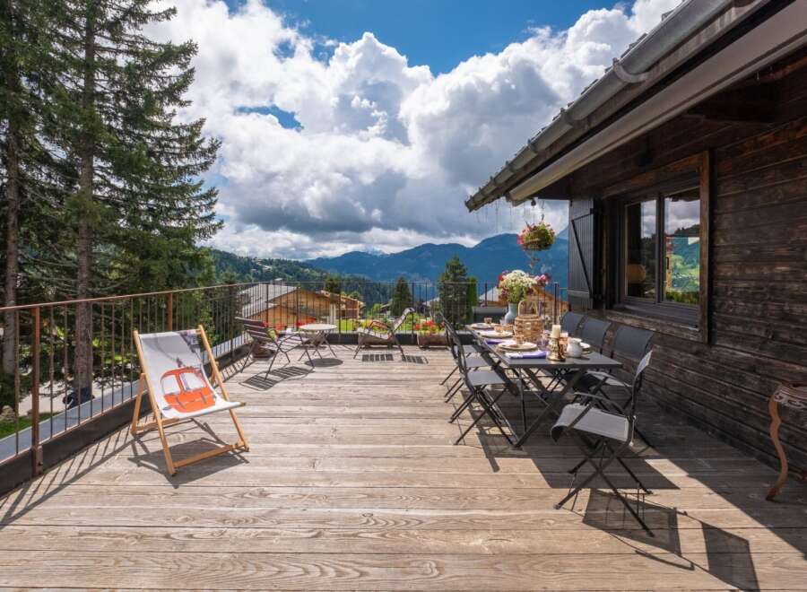 Enjoy breathtaking mountain views from this stunning property's expansive deck.
