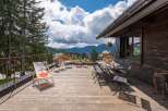 Enjoy breathtaking mountain views from this stunning property's expansive deck.